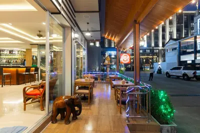 an elephant standing in the middle of a restaurant at Baan KetKaew Patong in Patong Beach