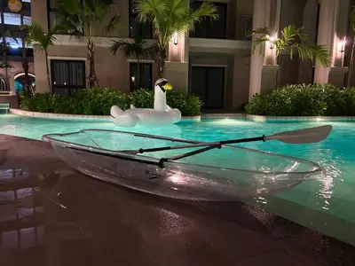 a swan boat and a swan paddle in a swimming pool at The Title Legendary Condo with a large terrace 308 in Bang Tao Beach