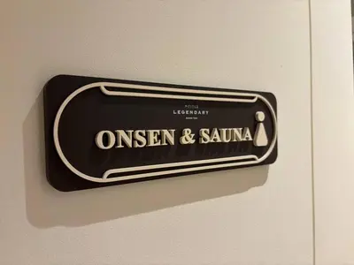 a sign on a door that says queen and samurai at The Legendary Apartment 408 in Bang Tao Beach