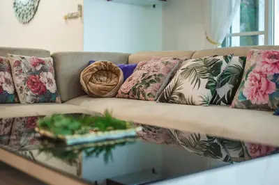 a couch with pillows on it in a living room at Platinum Villa Rawai 76 in Rawai Beach