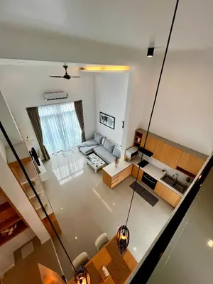 a living room with a couch and a table at Private 2-Bedroom Pool Villa in Rawai, Phuket in Rawai Beach
