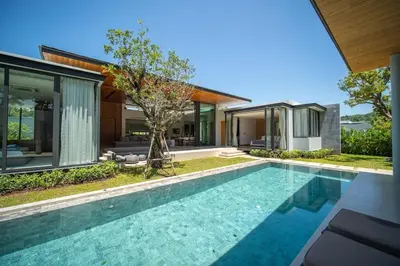 an image of a swimming pool in front of a house at UltraLuxury 4BDR pool villa Botanica Foresta in Ban Phru Champa