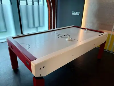 a ping pong table sitting in a room at The Legendary Bang Tao 2-bedrooms apart #701 in Bang Tao Beach