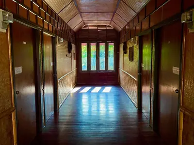 an empty hallway with a door in a building at OASIS by Four Twenty in Chalong