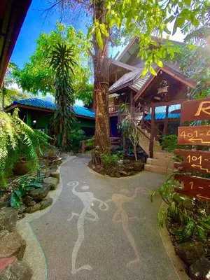 a drawing of a person on a path in front of a house at OASIS by Four Twenty in Chalong