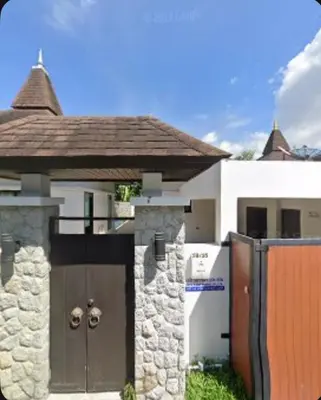 a house with a gate and a stone wall at Luxury 3 Bed Cherngtalay Villa Pool close to Beaches Dec Holiday Specials in Ban Phru Champa