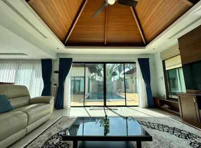 a living room with a couch and a glass table at Luxury 3 Bed Cherngtalay Villa Pool close to Beaches Dec Holiday Specials in Ban Phru Champa