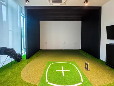 a room with a soccer field on the floor at Modern 1BR with Pool View The Title Legendary in Bang Tao Beach