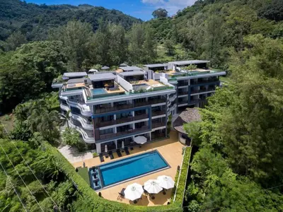 an aerial view of a building with a swimming pool at Apartment with sea view 2 beds in Kamala Beach