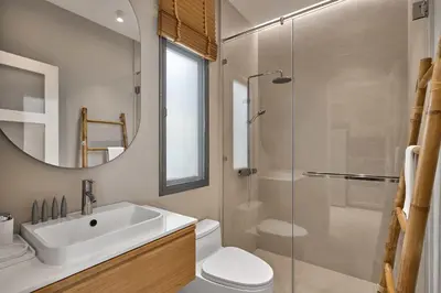a bathroom with a sink and a glass shower at Villa Moana 2BR Private Pool Naiharn beach in Rawai Beach