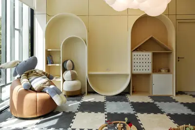 a living room with a couch and a room with archways at Cute apartment 52 m2 in Brand New condo! BangTao in Bang Tao Beach