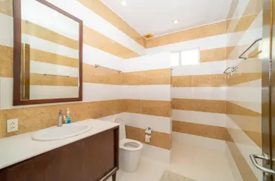 a bathroom with a sink and a toilet at Black Pearl 8 Bedroom Beach Villa Private Pool Gym Free Car Free Water and Electricity Maid 10 Meters to the Beach in Mai Khao Beach