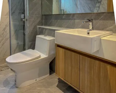 a bathroom with a toilet and a sink at Holiday Villa 2-BR J10, Private Pool, Rawai Beach in Phuket Town