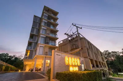 a building with a neon sign in front of it at Luxury room with Seaview in Ao Nang Beach