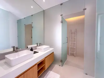 a bathroom with two sinks and a mirror at NEW! Luxury Pool Villa 4 Bedrooms in Lux Pride L27 Residence in Ban Pak Lak