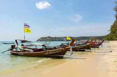 a group of boats sitting on the beach at Tropical villa Sweet Dreams R20, Private Pool, Rawai Beach in Phuket Town