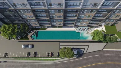 an overhead view of a large apartment building with a swimming pool at New Condo Boat Avenue Modern Loft 325 in Ban Thalat Choeng Thale