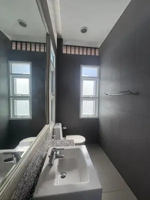 a bathroom with a sink and a mirror at Luxury Phuket Pool Villa in Ban Saiyuan (1)