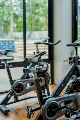 a group of three bikes parked in a gym at 405 Relife 5 Minutes Walk To Nai Harn Beach in Rawai Beach