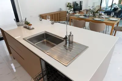 a kitchen with a sink in a counter top at Modern Villa 4-BR, Breeze - 10 min walk to NaiYang beach in Nai Yang Beach