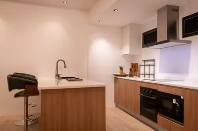 a kitchen with a sink and a counter top at Luxury 3 bed villa with private pool, Rawai Phuket in Rawai Beach