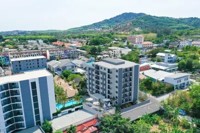 an aerial view of a city with buildings at Modern 61m² Apt - Central Chalong/ Fast WiFi in Ban Thalat Choeng Thale