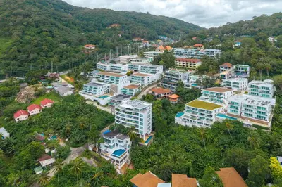 an aerial view of a city with buildings at Kata Beach Tropical Hillside Retreat Jungle View in Kata Beach
