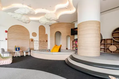 a lobby with a waiting area with clouds on the ceilings at Laya Resort Garden Escape- Tropical Serenity Suite in Layan Beach
