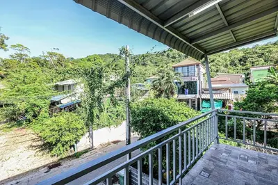 a view from the balcony of a house at Yellow apartments 46,47 in Ban Thalat Choeng Thale