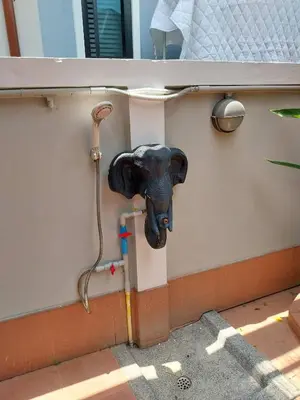 an elephant head on the side of a boat at House in the heart of Kamala in Kamala Beach