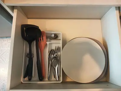 a drawer with a mirror and utensils in it at Z cape 1 one one in Laguna Phuket