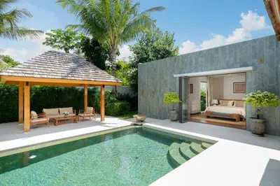 a swimming pool with a gazebo and a house at Anchan 4 bedroom near Beach in Phuket