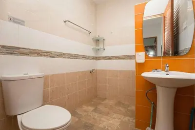 a bathroom with a toilet and a sink at 