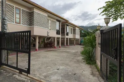 a house with a gate in front of it at 