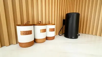 three stacks of paper towels next to a thermos at Mali Villa 57 in Patong Beach