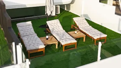 a model of a patio with three chairs and a table at Mali Villa 57 in Patong Beach
