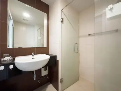 a bathroom with a sink and a shower at Apartments in the NICE condominium on Bang Tao Beach in Ban Thalat Choeng Thale