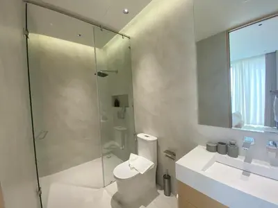 a bathroom with a shower and a toilet and a sink at 4bdr New Pool Villa Bangtao by Capital Pro ASH-37 in Ban Pak Lak