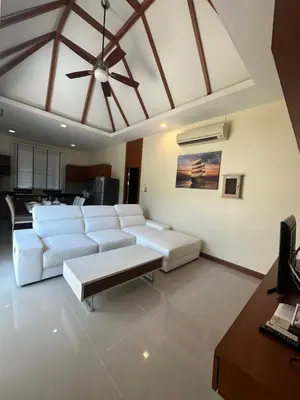 a living room with white couches and a ceiling at 3 bedroom Vip Villa Rawai Phuket in Rawai Beach