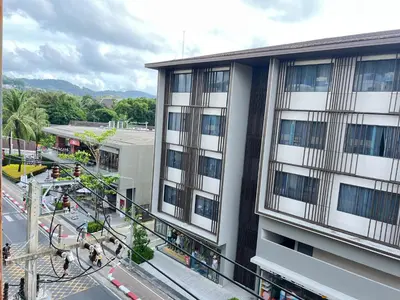 an overhead view of a building with a street at The Sealect Hotel in Kata Beach