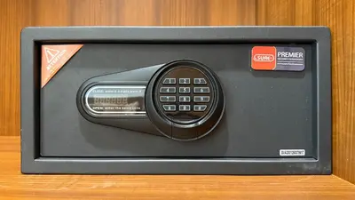 a remote control in a box on a table at Stylish Family Townhouse 3 Bdr in Chalong