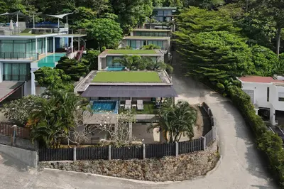 an aerial view of a house with a yard at Duplex Villa Natural Touch A2 2BR with scenic view and rooftop terrace in Kamala Beach