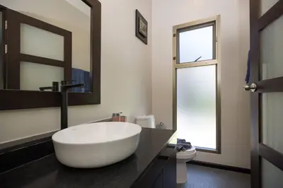 a bathroom with a large white bowl sink on a counter at Private 3BR Pool Villa Mylico 3min drive Nai Harn Beach in Rawai Beach