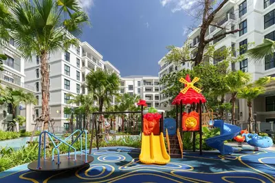 a playground with a slide and a play park at Cozy 1 Bdr Title Legendary Bang Tao 5 min to the Beach in Bang Tao Beach