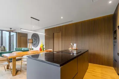 a kitchen with a counter and a dining room at V263 Brand New 3BR Super Modern Pool Villa - Calathea in Thalang