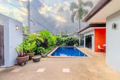 a swimming pool in the backyard of a house at V265 2BR Pool Villa Near Fitness Gyms Muay Thai in Ban Saiyuan (1)