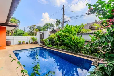 a swimming pool in the backyard of a house at V265 2BR Pool Villa Near Fitness Gyms Muay Thai in Ban Saiyuan (1)