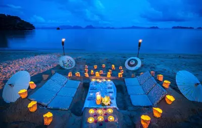 a dinner party on the beach at night at Paradise Koh Yao - Seaview Pool Villa in Ko Yao Noi