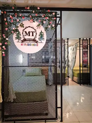 a metal gate with a sign on it in a store at MT Friend Hostel Phuket Town in Phuket Town
