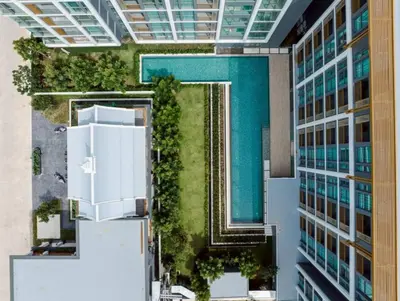 an aerial view of a building with a pool at The Ozone Condominium B130 Laguna in Laguna Phuket